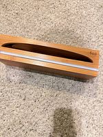 Top view showing oval opening and cutter strip