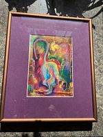 Front view showing artwork, mat and frame