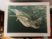 Full view of the signed block print showing image and margins