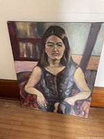 Front view of full unstretched portrait canvas showing subject and overall condition