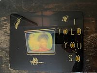 Front view showing entire artwork with text and image