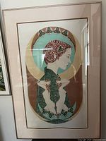 Full view of framed mixed media artwork