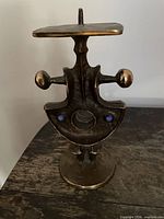 Front view of Brutalist bronze candlestick
