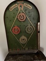 Full front view of Lindstrom’s Steeple Chase game showing entire playfield and plunger