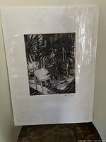 Full view of matted, shrink-wrapped etching