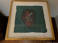 Frontal view of framed Cheryl Ruddock gouache painting