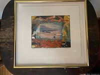 Full view of framed artwork showing mat and frame
