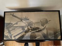 Full view of framed photographic print