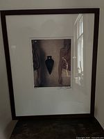 Front view of framed photographic print showing artwork, mat and frame