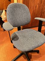 Front view showing seat, backrest, and armrests