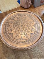 Top view showing complete engraved copper tray