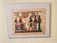 Full view of framed papyrus print hanging on wall