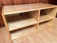 Front view showing shelves, grommet and finish