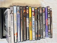 Spines of all DVD cases aligned for title visibility