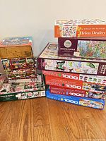 Overall view of the 12 boxed puzzles stacked