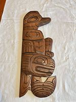 Front view of carved wood wall art