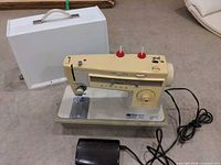 Singer Stylist 513 machine with foot pedal, power cord and case