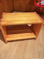 Front view of solid pine two-tier shelf