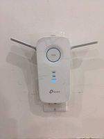 Front view showing LED indicators and logo