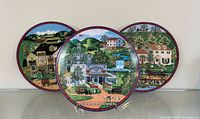 Three Charles Wysocki plates front view