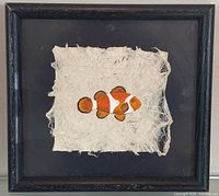Framed watercolour clownfish painting on tapa cloth, full view