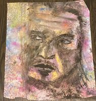 Full view of signed pastel and charcoal portrait on paper showing entire artwork and torn lower edge