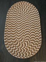 Full view of oval braided rug