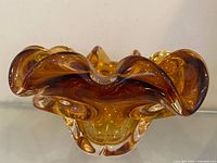 Front view showing full free-form shape and amber colour