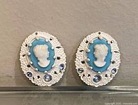 front view of both earrings showing cameos and rhinestones