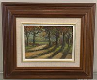 Full view of framed oil painting