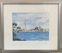 Framed watercolour painting with mat and silver frame