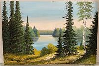 Full view of framed painting showing landscape composition