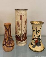 Front view of all three vases