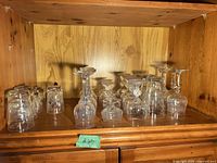Shelf with entire assortment of stemware and tumblers