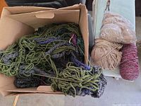 Box of mixed color yarn scraps