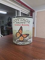 Front of Cottage Paint furniture restoring paint can showing label, volume and mid-tone base.
