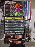 Stack of DVD cases showing titles and spines