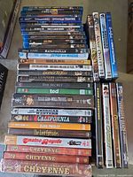 Front view of stacked DVDs and Blu-rays showing most titles