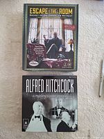 Front view of both boxed items showing titles and artwork