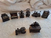 Group shot of all eight miniature metal pencil sharpeners