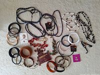 All jewelry pieces arranged on surface