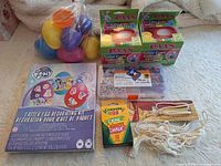 All items arranged on surface showing packaging and contents