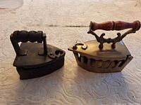 Front view of both miniature irons side by side closed