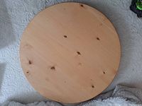 Top view of the wooden lazy Susan showing surface and knots