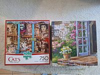 Buffalo Cats Holy Curiosity 750 and floral doorway puzzle boxes