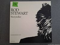 Front of outer slipcase showing title and silhouette artwork