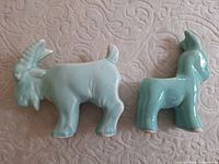 front view of both ceramic animal planters