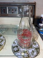 Full view of Calnans Dairy quart bottle