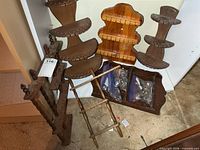 Group of six wooden spoon racks and four bags of teaspoons