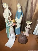 Group shot showing all five figurines